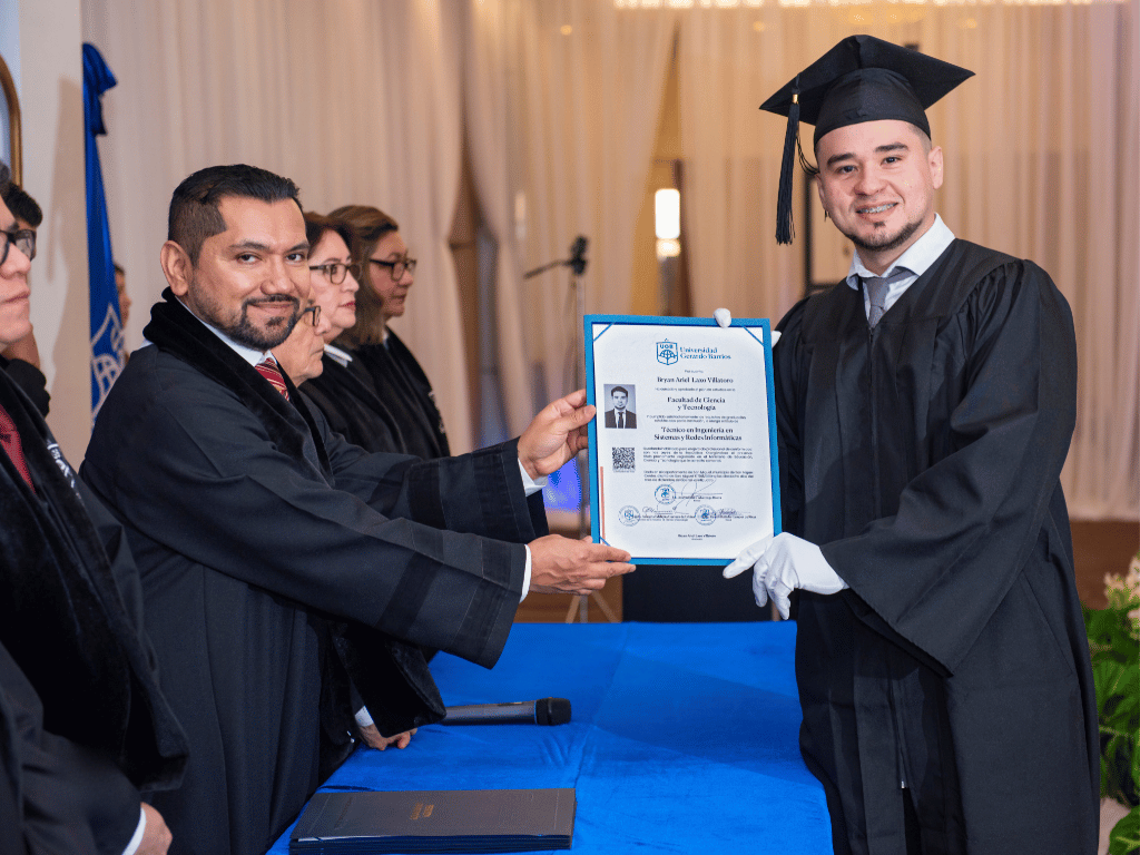 Bryan Lazo receiving his Systems Engineering degree during graduation ceremony